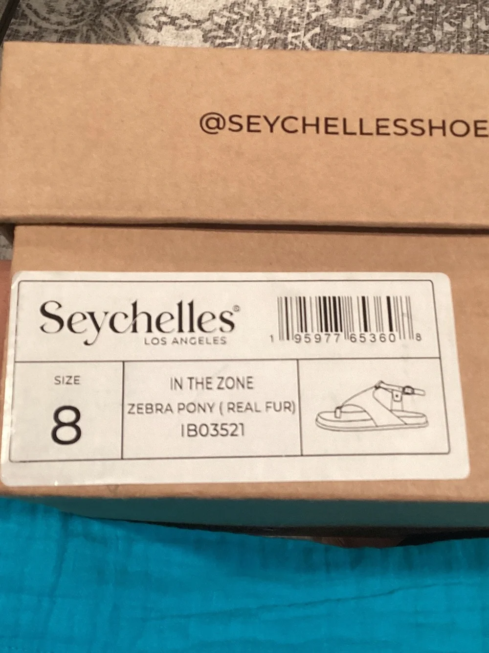 Seychelles Zebra-Print Thong Sandal in Black and Cream